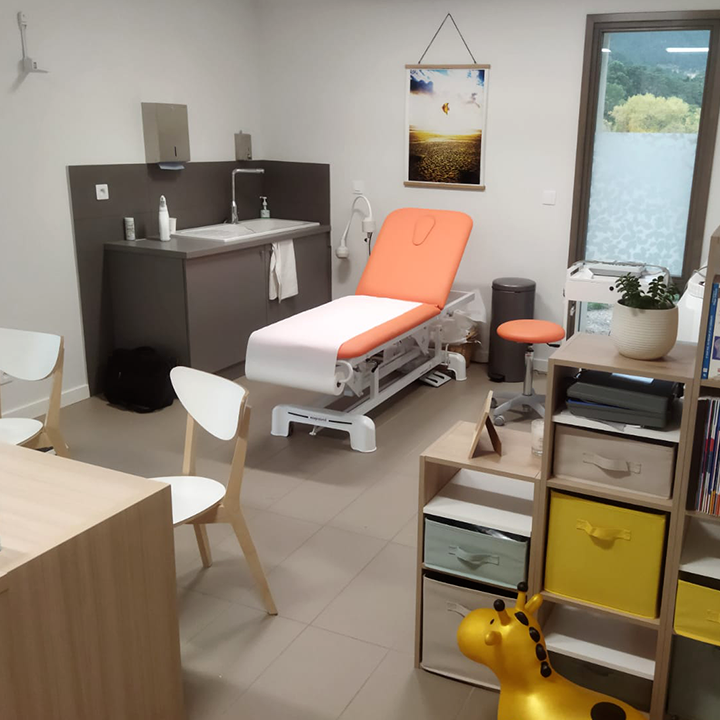 Barber 1 young man with beard smiling and wearing a brown shirt